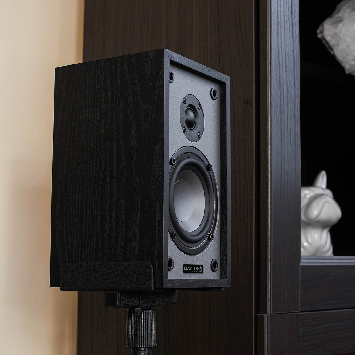 In-use photo of speaker on a stand